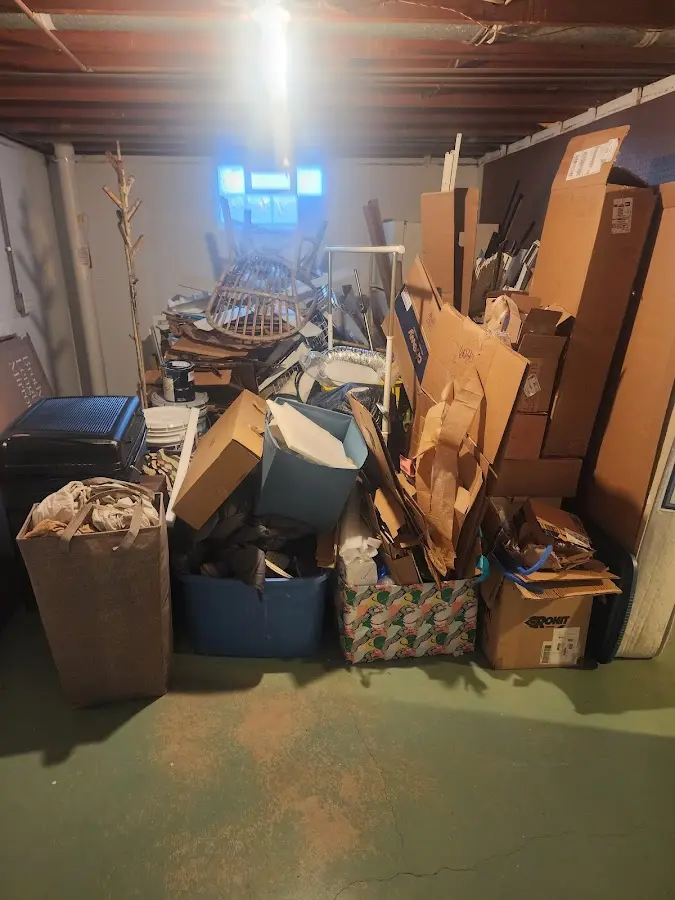 Roll-off dumpster container at job site for 6 Yard Dumpster Rental in Derry